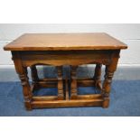 A REPRODUCTION GEORIGAN STYLE OAK COFFEE/NEST OF THREE TABLES