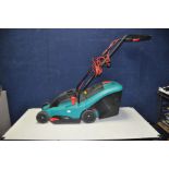 A BOSCH ROTAK 34 ELECTRIC LAWN MOWER with grass box ( PAT pass and working)