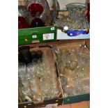 FOUR BOXES OF CUT/COLOURED AND OTHER GLASSWARES, to include a ships decanter, glasses, vases,