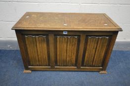 AN OAK LINENFOLD BLANKET CHEST, width 89cm x depth 42cm x 53cm (condition- fluid marks to top)