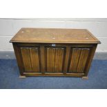 AN OAK LINENFOLD BLANKET CHEST, width 89cm x depth 42cm x 53cm (condition- fluid marks to top)