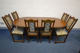 AN OAK OLD CHARM EXTENDING DINING TABLE with single leaf and six dining chairs, open width 208cm x