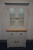 A PARTIALLY PAINTED AND OAK DISPLAY CABINET, with double glazed doors, led lighting, and two