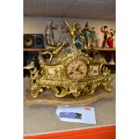 A LATE 19TH CENTURY FRENCH STYLE GILT METAL MANTLE CLOCK, the hand painted dial has a river