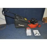 A MAKITA EUM430 PETROL LAWN MOWER with grass bag and manual (engine pulls and starts)