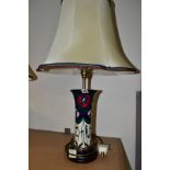A MOORCROFT POTTERY TABLELAMP IN THE TRIBUTE TO CHARLES RENNIE MACKINTOSH PATTERN, with original
