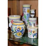 FIVE PIECES OF POOLE POTTERY, comprising three various vases including traditional LE pattern