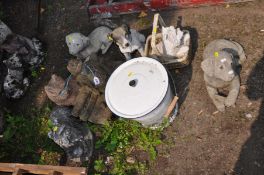 SEVEN SMALL GARDEN FIGURES AND A ENAMEL LIDDED BUCKET including a composite elderly gent on a bench,