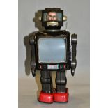 A TINPLATE AND PLASTIC BATTERY OPERATED TV ROBOT, marked 'Made in Japan' but no makers marking,
