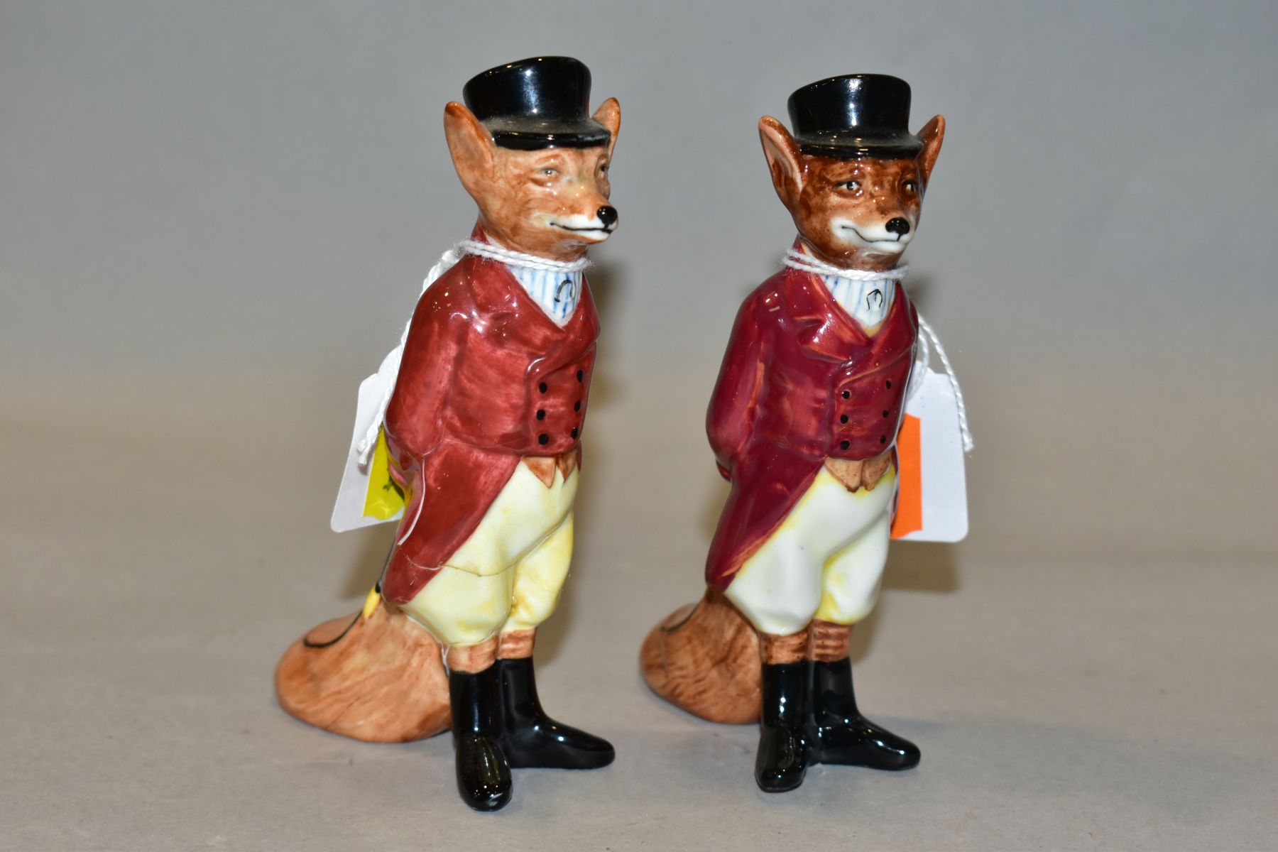 TWO ROYAL DOULTON HUNTSMAN FOX, D6448, one is badly cracked and does not bear the model number,