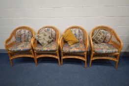 A SET OF FOUR WICKER TUB CHAIRS