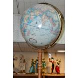 A REPLOGLE WORLD CLASSIC 16 INCH DIAMETER TERRESTRIAL GLOBE, raised mountain ranges, mounted to a