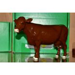 A BOXED BESWICK RARE BREEN RED POLL COW, No 4111, designed by Robert Donaldson, Beswick crest