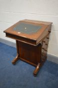 A LATE VICTORIAN MAHOGANY AND MARQUETRY INLAID DAVENPORT, four drawers and dummy drawers opposing,