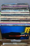 A TRAY CONTAINING OVER SIXTY LP'S OF MOSTLY ROCK MUSIC, including by Queen, three by David Bowie,