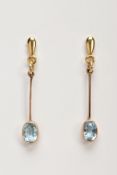 A PAIR OF 9CT GOLD AQUAMARINE EARRINGS, each drop earring designed with a tear shape terminal