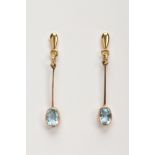 A PAIR OF 9CT GOLD AQUAMARINE EARRINGS, each drop earring designed with a tear shape terminal