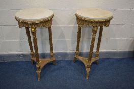 A PAIR OF 20TH CENTURY CIRCULAR GILTWOOD LOUIS XVI STYLE OCCASSIONAL TABLES, with marble tops,