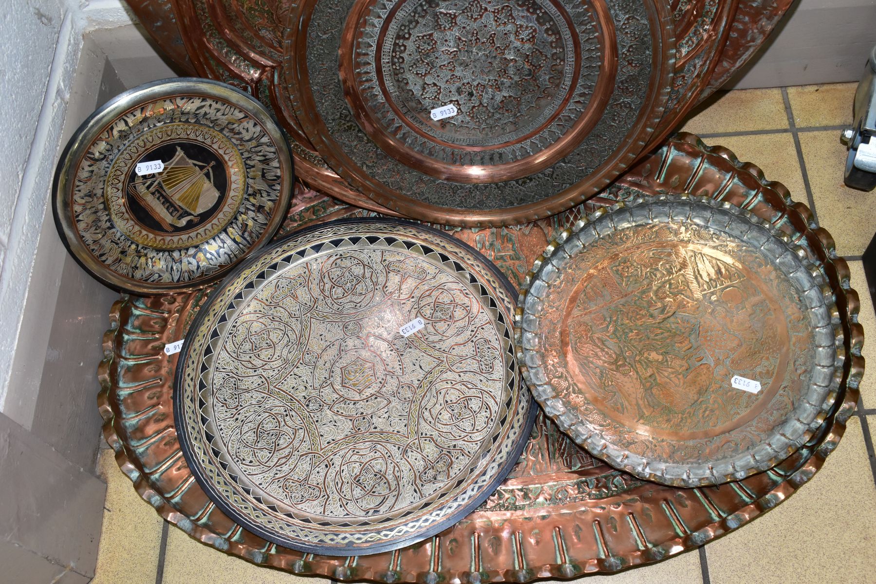 A COLLECTION OF SEVEN INDIAN/MIDDLE EASTERN METAL PLATTERS, CHARGERS AND TRAYS, all either - Image 5 of 7