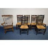 A SET OF SIX OAK RUSH SEATED LADDERBACK CHAIRS, all chairs varnished differently, along with spindle