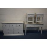 A CREAM FINISH FOUR PIECE BEDROOM SUITE, comprising a sideboard/chest of seven assorted drawers,