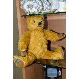 A MERRYTHOUGHT HARRODS TEDDY BEAR, limited edition No. 496 of 1000, golden plush jointed body,