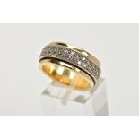 A YELLOW METAL DIAMOND SET SWIVEL BAND RING, wide yellow metal band, approximate width 9.3mm, with a