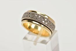 A YELLOW METAL DIAMOND SET SWIVEL BAND RING, wide yellow metal band, approximate width 9.3mm, with a