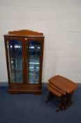 A CHERRYWOOD CHINA CABINET, with raised back, double doors enclosing three fixed glass shelves,