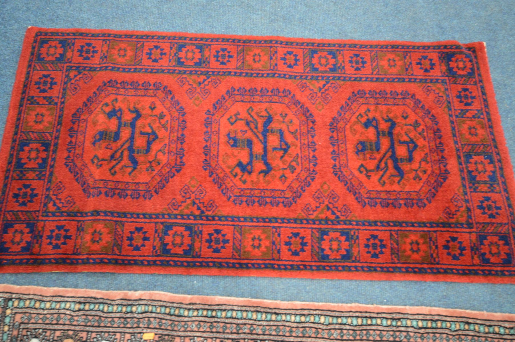 A LARGE WOOLLEN TABRIZ STYLE CARPET SQUARE, 346cm x 250cm and a pink tekke rug and a red rug (3) - Image 7 of 7