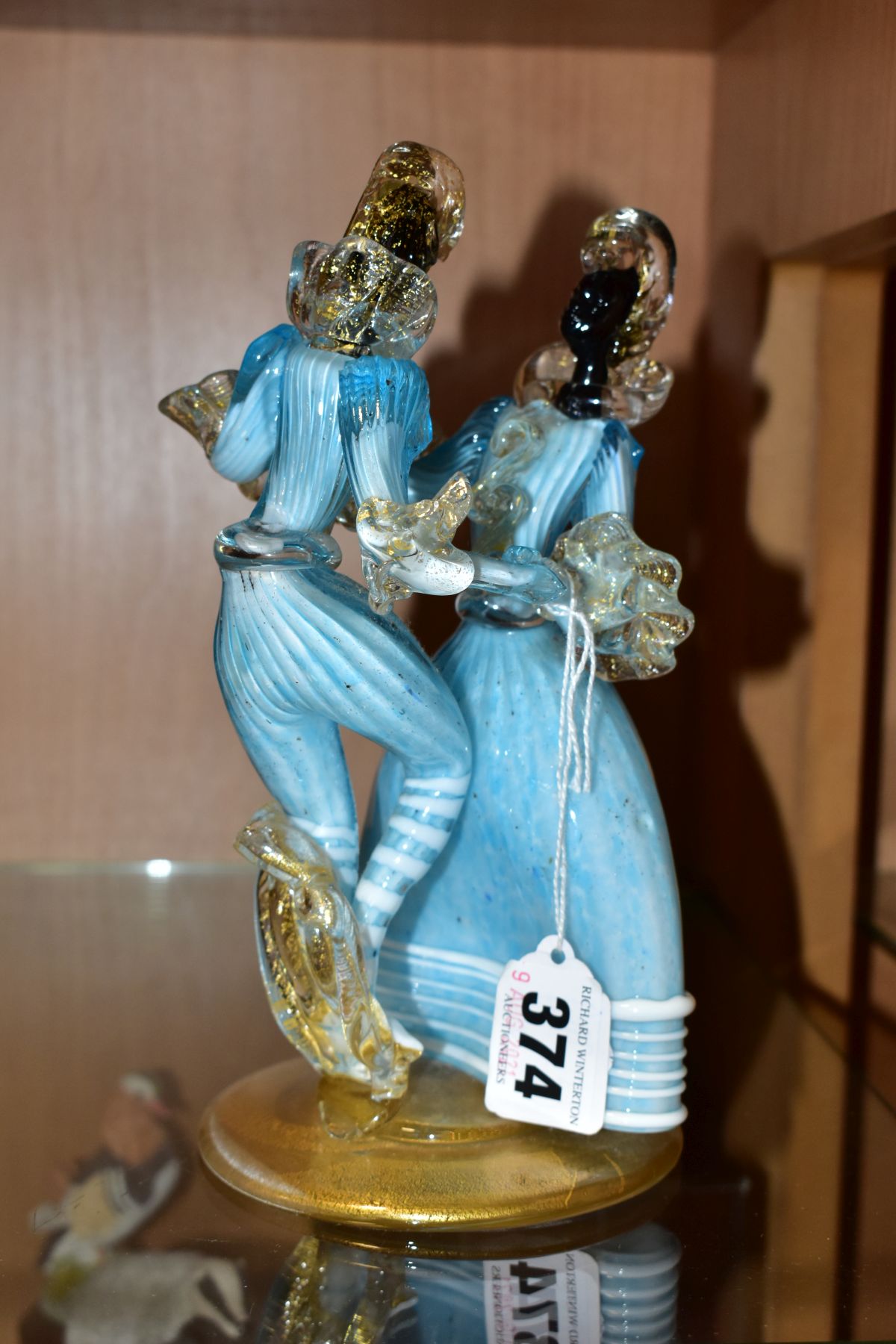 A MURANO GLASS FIGURE GROUP OF A LADY AND GENTLEMAN DANCING, blue and white costume with clear and