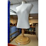 A SPERLING MODELS FEMALE MANNEQUIN BODY, height adjustable via a chrome column attached to a