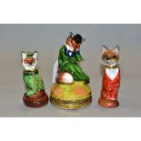A ROYALE STRATFORD FOX BONBONNIERE AND TWO SIMILAR SCENT BOTTLES, all three modelled as seated foxes