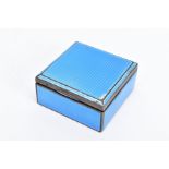 A 1930'S SILVER GUILLOCHE ENAMEL TRINKET BOX, the square hinged silver box covered in blue guilloche