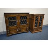 AN OAK OLD CHARM HIFI CABINET, with double lead glazed doors and an oak double door lead glazed