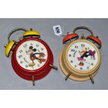 TWO GERMAN MADE MICKEY AND MINNIE MOUSE ALARM CLOCKS, of metal and plastic construction, both appear