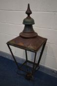 A DISTRESSED SQUARE TAPERED COPPER LANTERN, marked W Parkinson & Co, London and Birmingham, 41cm