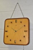 A SMITHS SECTRIC MID CENTURY ELECTRIC WALL CLOCK, beech and mahogany veneer construction,