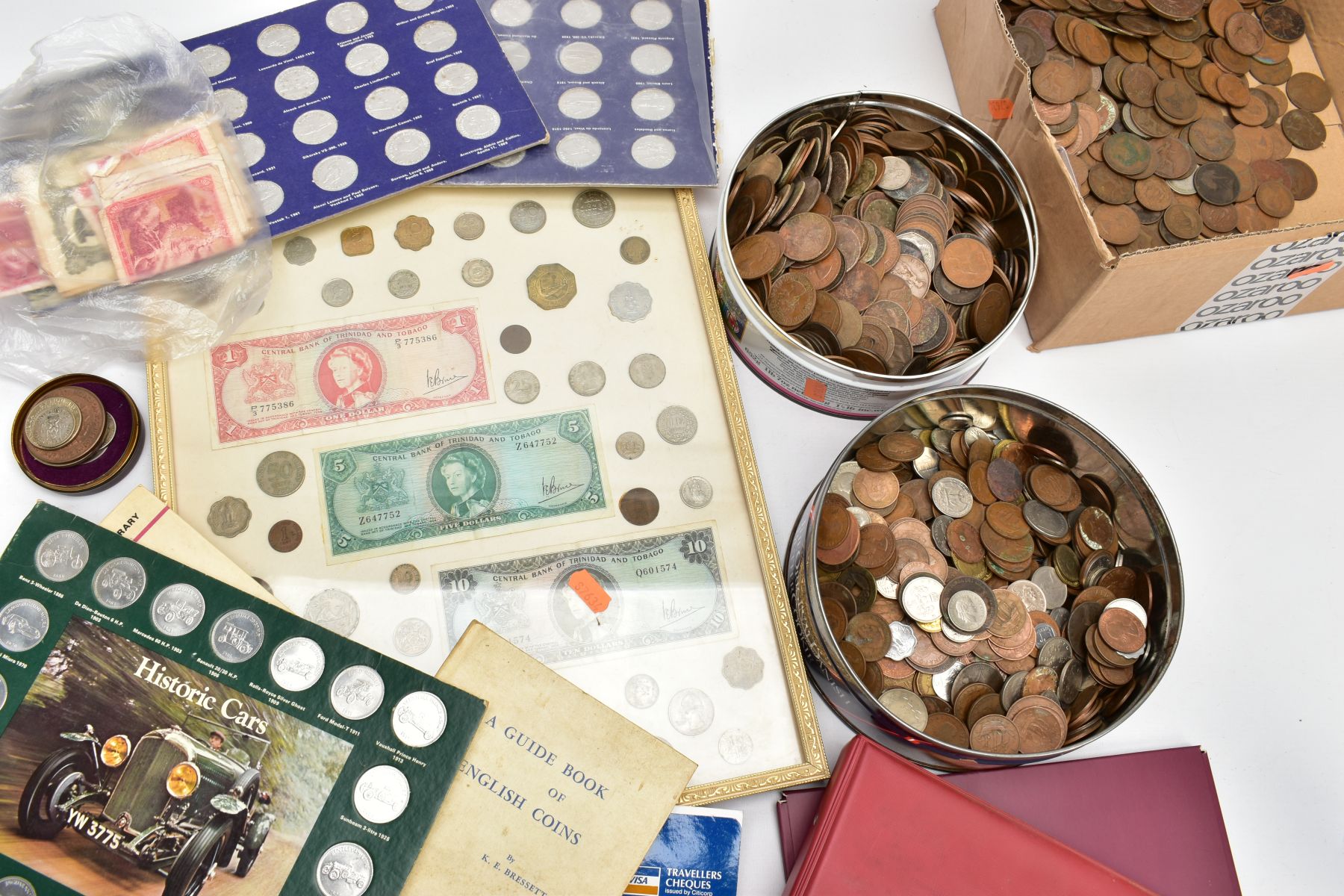 A LARGE PLASTIC TRAY OF MIXED COINS to include a framed display of coin and banknotes, some Shell