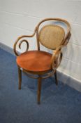 A DINETTE BEECH BENTWOOD ARMCHAIR, with bergère back