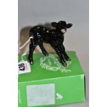 A BESWICK ABERDEEN ANGUS CALF, No.1406A, oval Beswick backstamp, with odd box (condition: no obvious
