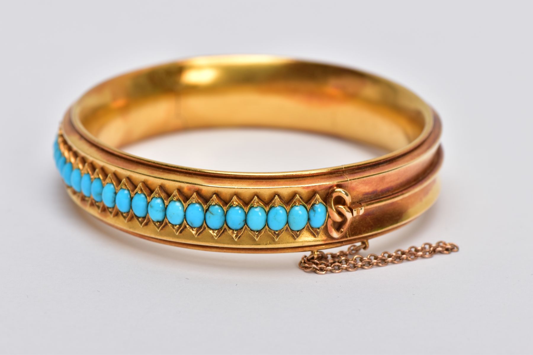 A LATE VICTORIAN TURQUOISE HINGED BANGLE, of slight concave design, the back half with central - Image 4 of 4