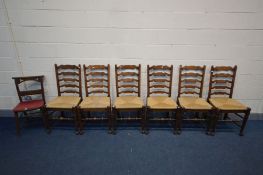 A SET OF SIX OAK LADDERBACK DINING CHAIRS, with rush seats, along with a pair of beech chapel