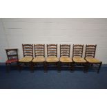 A SET OF SIX OAK LADDERBACK DINING CHAIRS, with rush seats, along with a pair of beech chapel