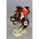 A BESWICK HUNTSMAN (ON REARING HORSE), No 868, style one, second version, brown, Beswick crest