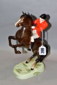 A BESWICK HUNTSMAN (ON REARING HORSE), No 868, style one, second version, brown, Beswick crest