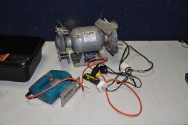 A HILKA 6in BENCH GRINDER ( stand cracked and missing parts), a Black and Decker jigsaw and a Uhu
