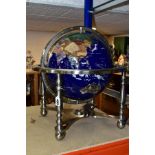 A BOXED OSBORNE AND ALLEN GEM STONE TERRESTRIAL GLOBE, inset with semi-precious stones, supported by