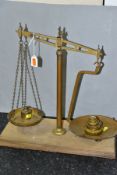 AN EARLY 20TH CENTURY BALANCE BEAM SCALE WITH WEIGHTS, impressed G.R mark with calibration