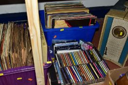 THREE BOXES OF RECORDS, CDs AND DVDS AND A PORTADYNE RECORD PLAYER, (not tested) the Cds to